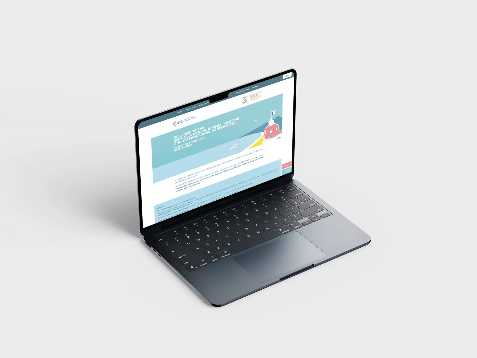 macbook pro ouvert sur fond gris avec site web coloré